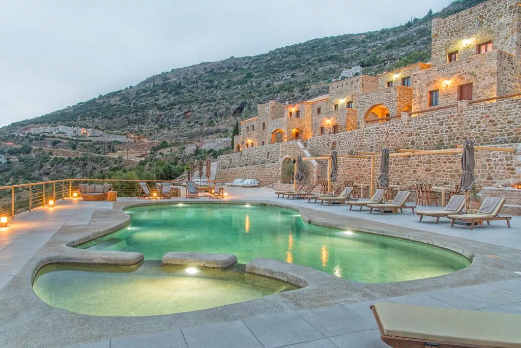 Outdoor pool area at Brazzo di Maina, looking toward the sea